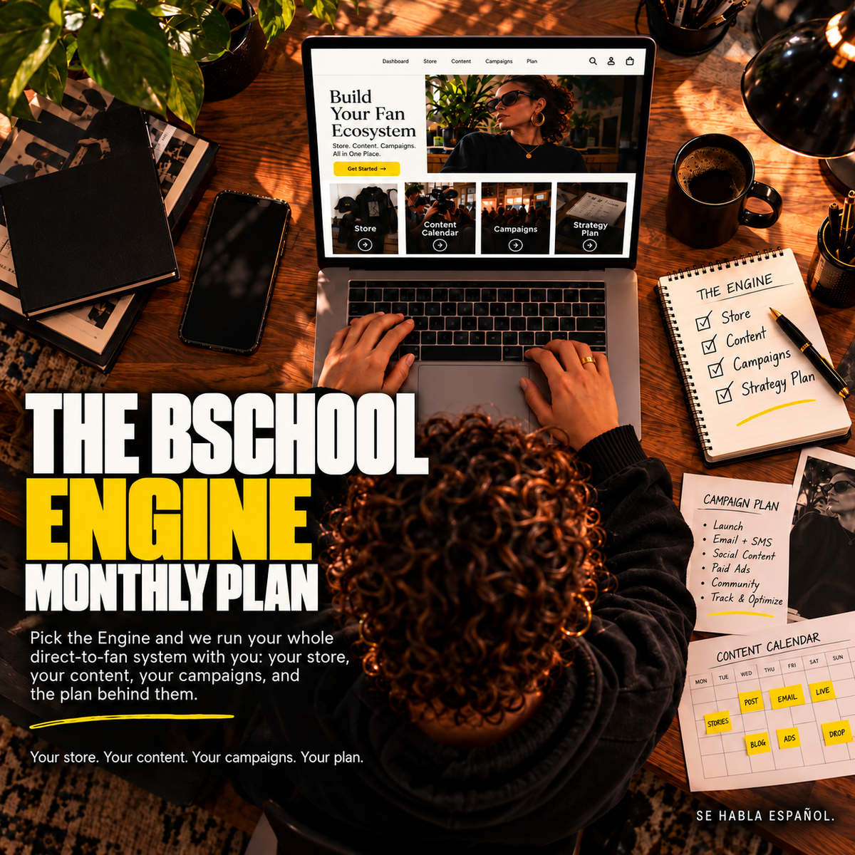 BSchoolForTheBlock BSchool Engine Monthly Plan product image featuring an overhead view of a creative entrepreneur working on a laptop, surrounded by campaign plans, a content calendar, and handwritten strategy notes. Bold white and yellow typography highlights a direct-to-fan business management system covering Shopify, content, marketing, and campaigns, with the message “Se habla español.”